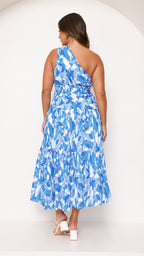 Women wearing the Harrow Elodie floral one-shoulder maxi dress for wedding guest, featuring a dreamy floral pattern and elegant design.