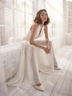 Harrow Frances elegant halter V-neck wide-leg jumpsuit for women, perfect for wedding guests. Black fabric with stylish fit.