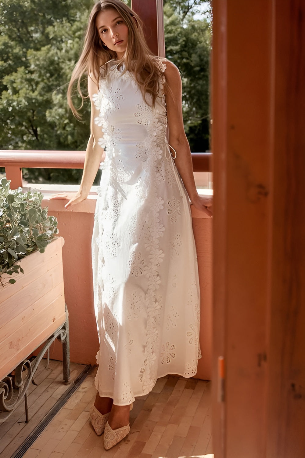 Harrow Gabriela sleeveless lace-up maxi dress for women, elegant wedding guest attire with flowing fabric and sophisticated design.