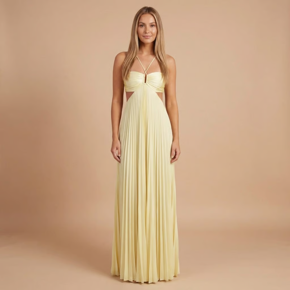Elegant halter maxi dress by Harrow featuring pleated fabric, suitable for women attending weddings as a stylish guest.