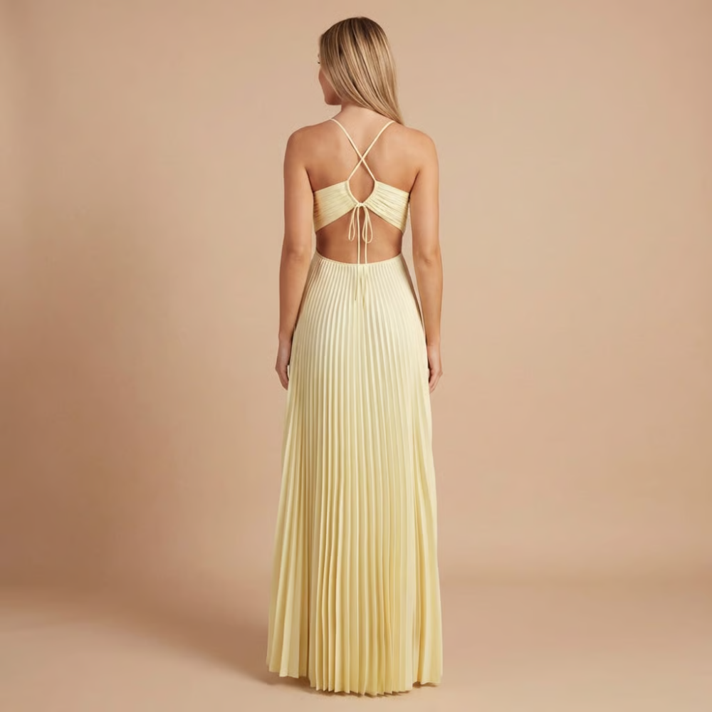 Elegant Harrow Gloria pleated halter maxi dress for women, ideal for wedding guests, featuring flowing fabric and sophisticated design.