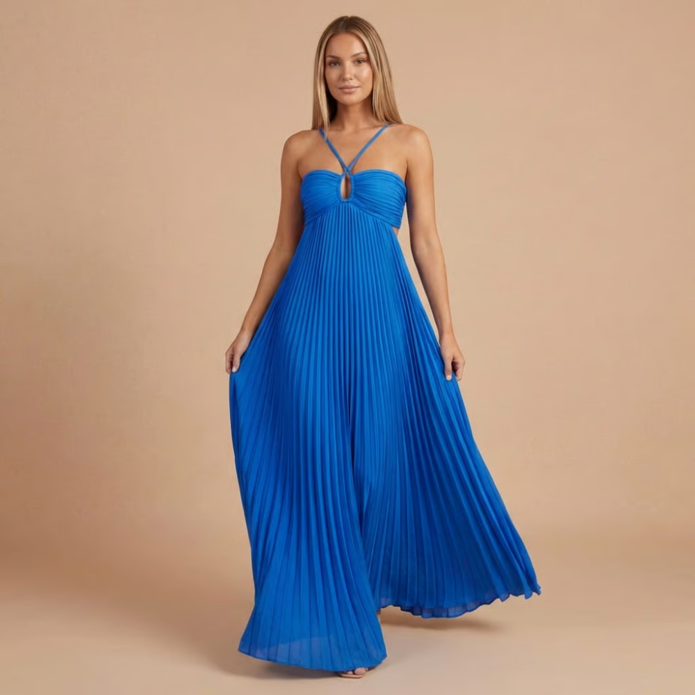 Elegant pleated halter maxi dress for women, ideal for wedding guests, by Harrow. Features flowing fabric and sophisticated design.