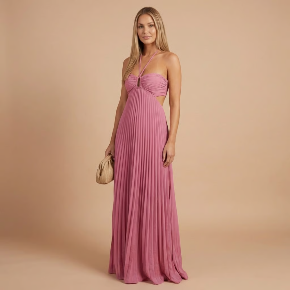 Elegant halter maxi dress by Harrow featuring pleated fabric, perfect for women attending weddings as a stylish guest.
