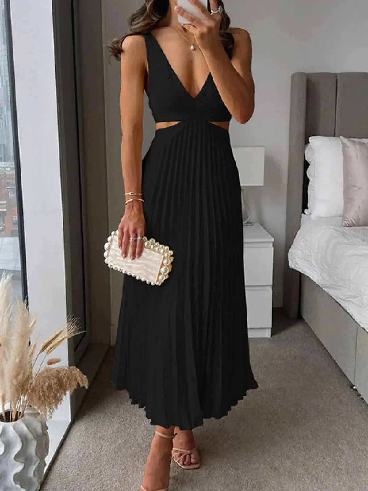 Elegant Harrow Grace pleated midi dress for women, featuring a V-neck and cutout details, perfect for wedding guests.