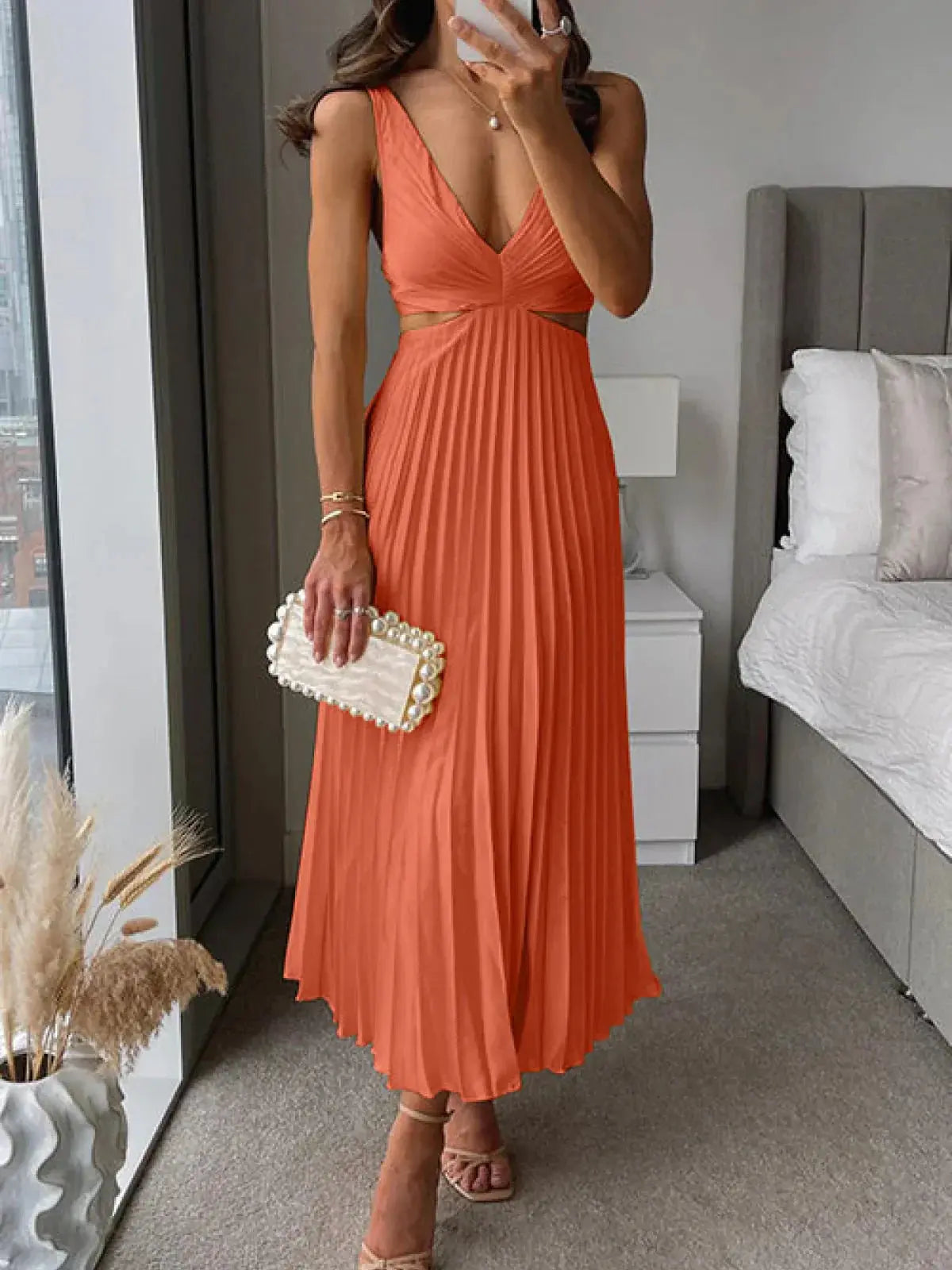 Harrow Grace elegant pleated midi dress for women, featuring V-neck and cutout details, ideal for wedding guest attire.