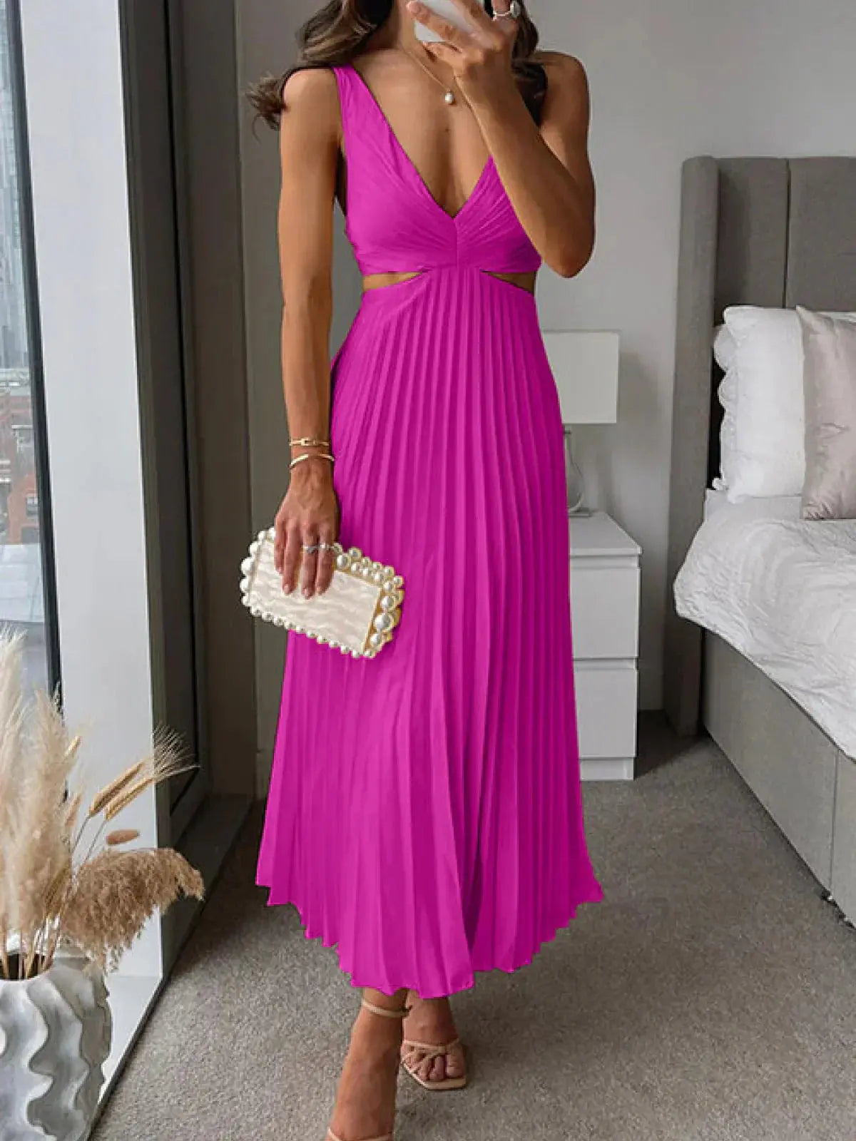 Elegant pleated midi dress for women by Harrow, featuring a V-neck and cutout details, perfect for wedding guest attire.