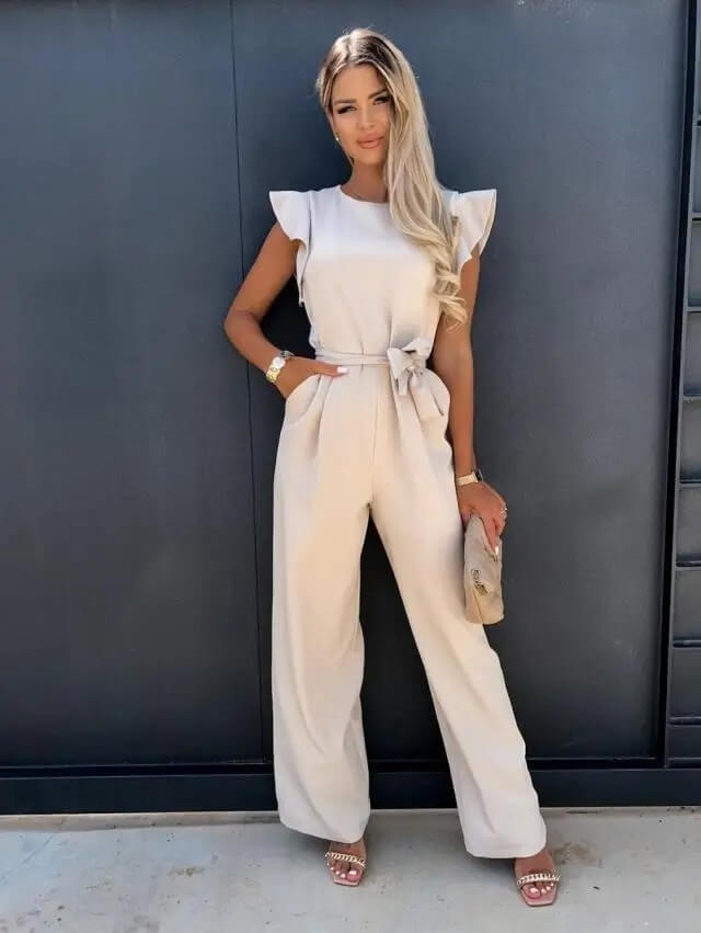 Women wearing the Harriet elegant ruffle sleeve wide-leg jumpsuit for wedding guests, featuring stylish ruffle details and a flowing fit.