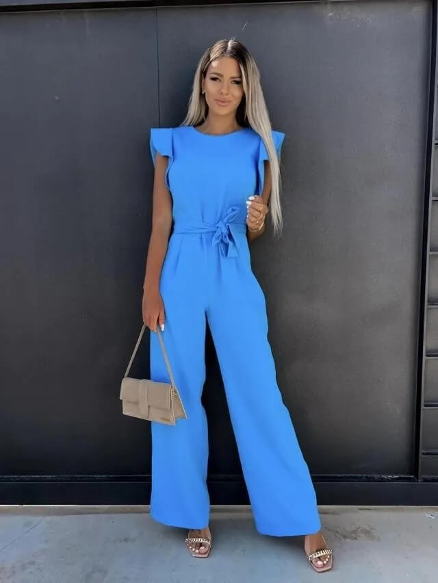 Women wearing the Harriet elegant ruffle sleeve wide-leg jumpsuit by Harrow, perfect for wedding guests, showcasing stylish ruffle details.