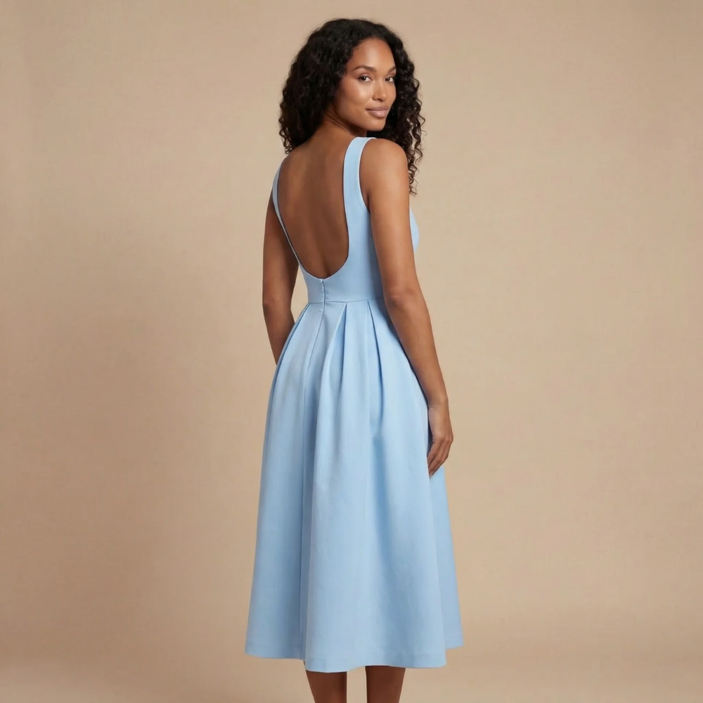 Harrow Hilde sleeveless boat neck midi dress for women, perfect for wedding guests, featuring elegant, flowing fabric and a sleek silhouette.