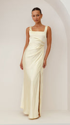 Women wearing Harrow Hope satin maxi dress with square neckline, perfect for wedding guest attire.