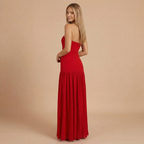 Elegant strapless maxi dress for women, featuring a slit, designed for wedding guests by Harrow.