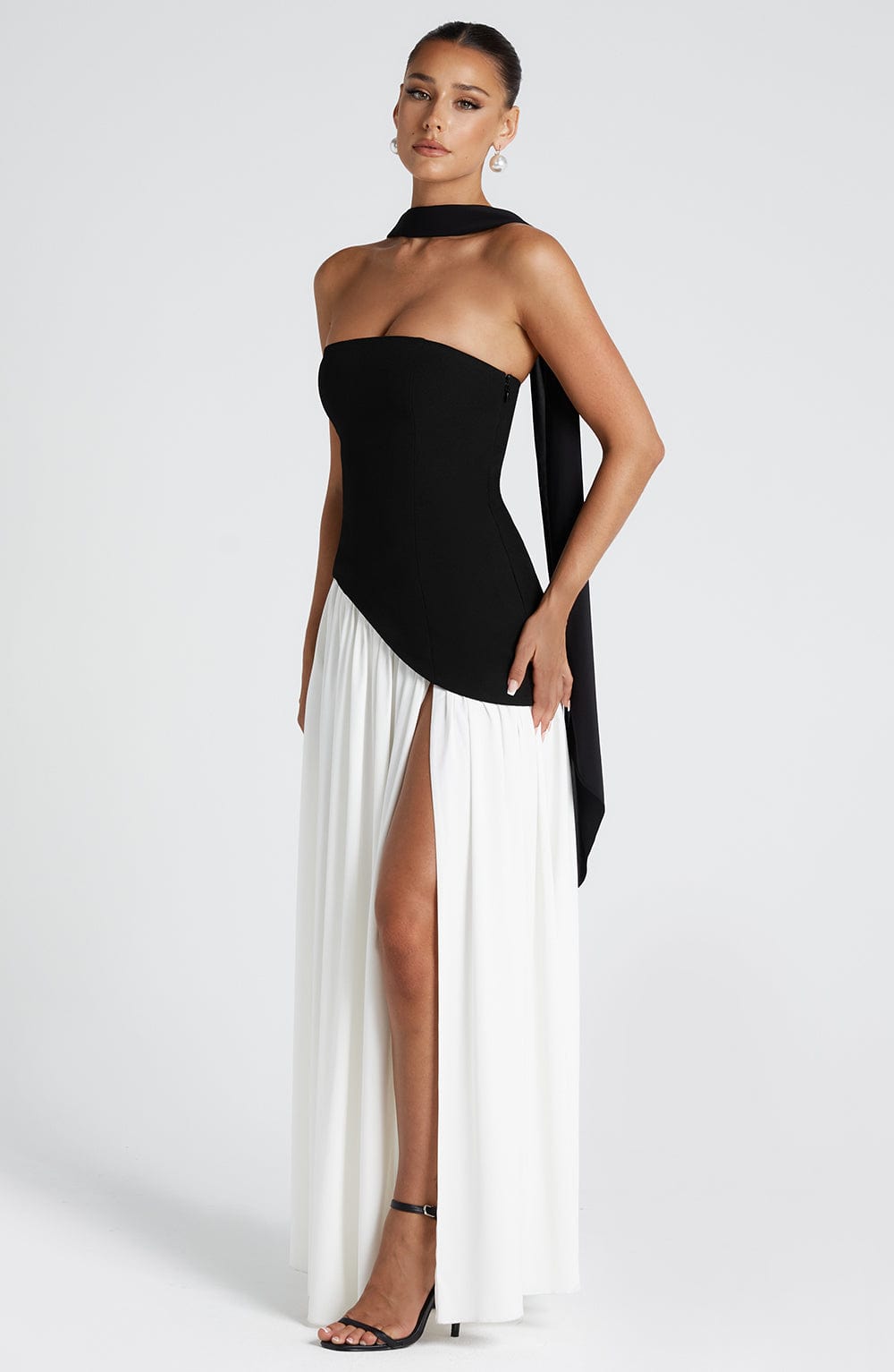 Elegant strapless maxi dress by Harrow for women, featuring a slit, perfect for wedding guests.