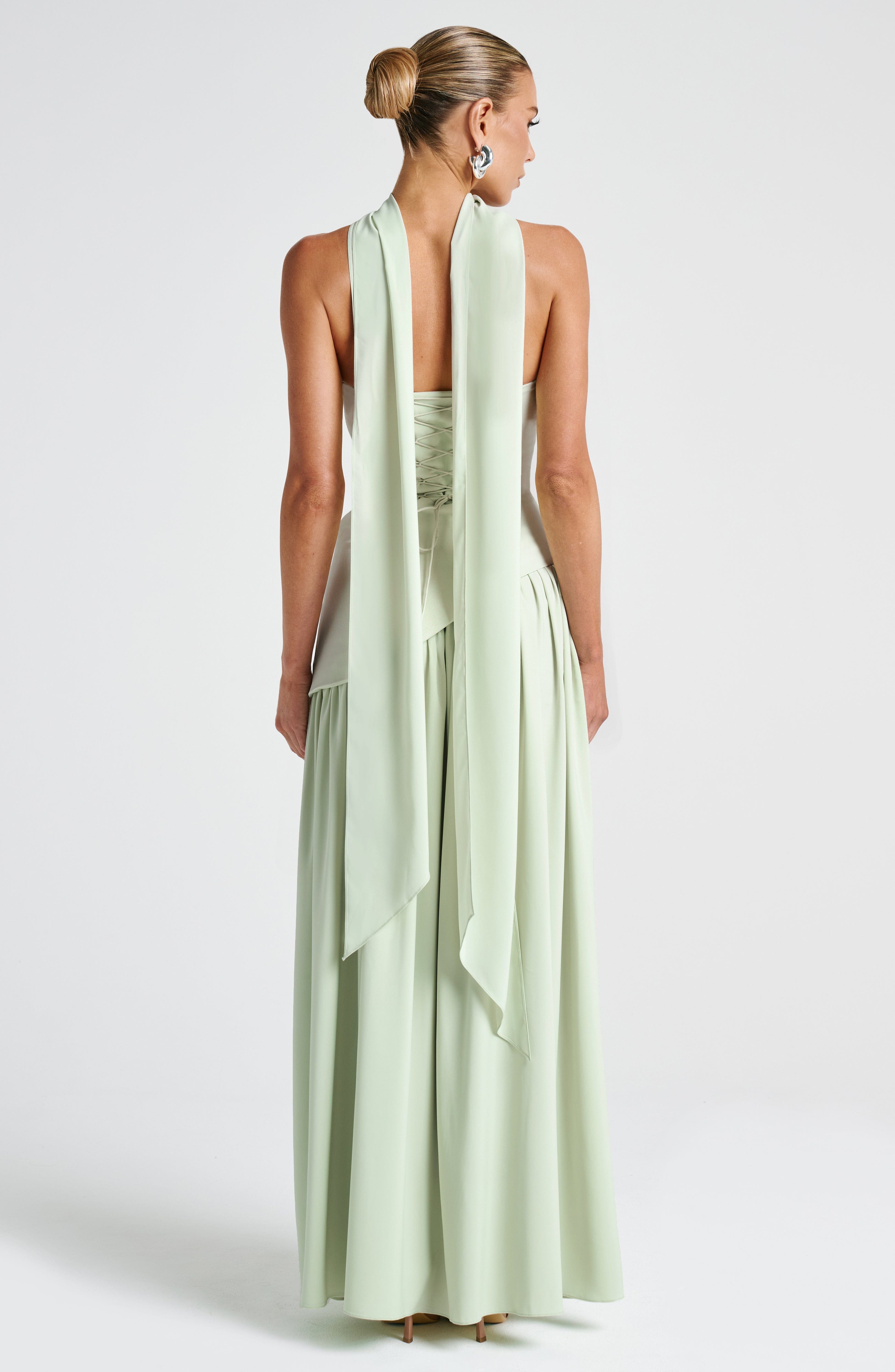 Elegant strapless maxi dress for women by Harrow, featuring a slit, perfect for wedding guests and formal occasions.