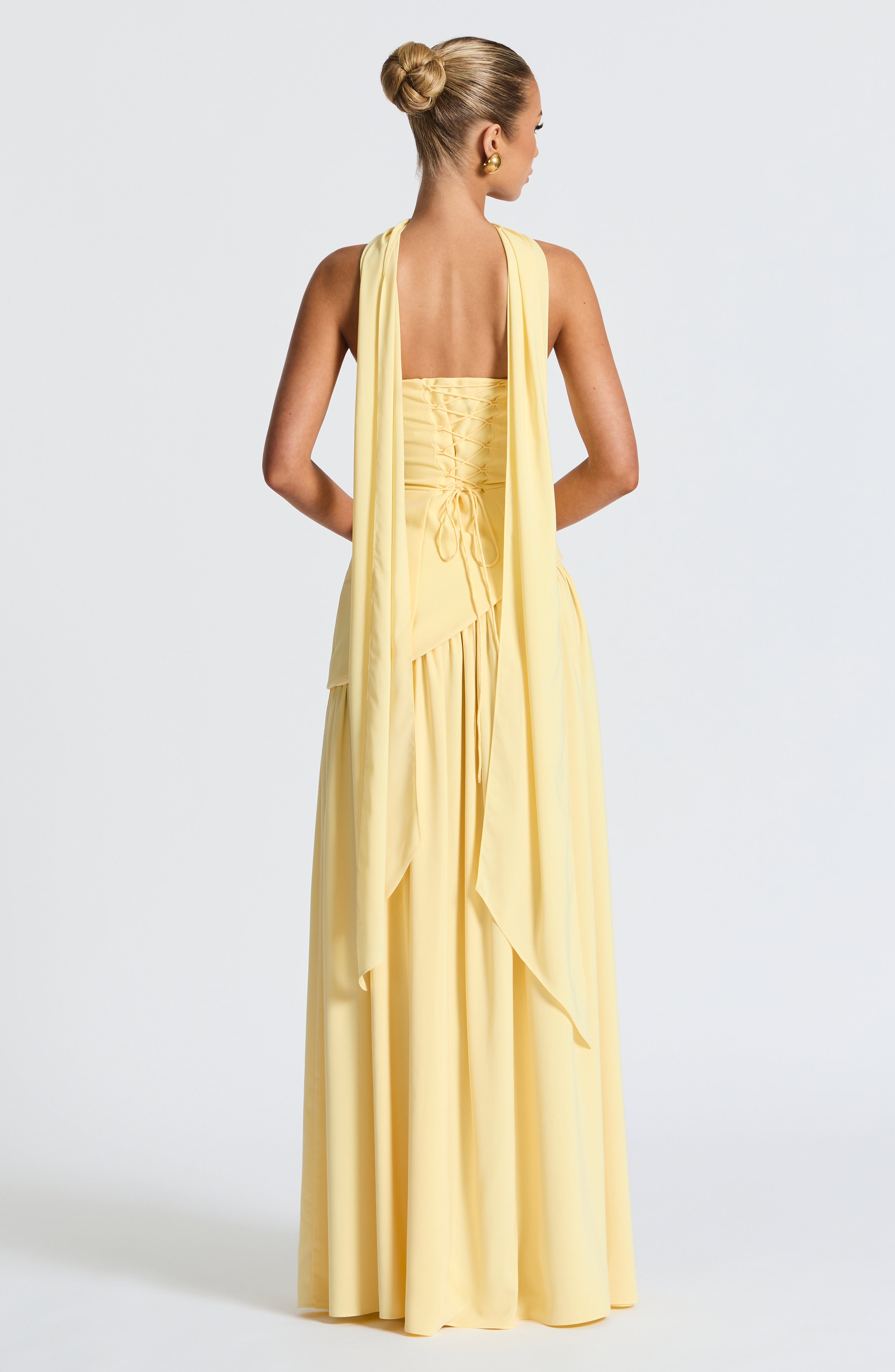 Elegant strapless maxi dress for women by Harrow, featuring a slit, perfect for wedding guests.