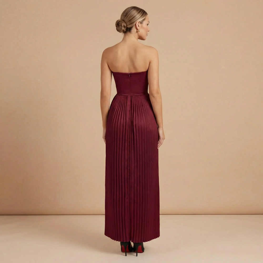 Elegant strapless pleated maxi dress for women, perfect for wedding guests, by Harrow.