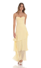 Women wearing the Harrow Irina ruffle maxi dress with a sweetheart neckline, perfect for wedding guests.