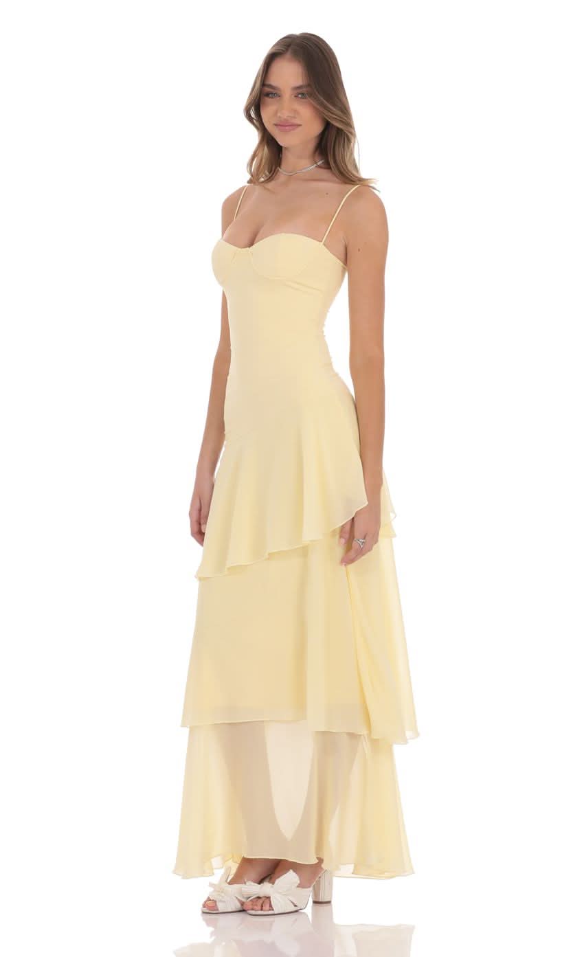 Women wearing the Harrow Irina playful ruffle maxi dress, featuring a sweetheart neckline, suitable for wedding guests.