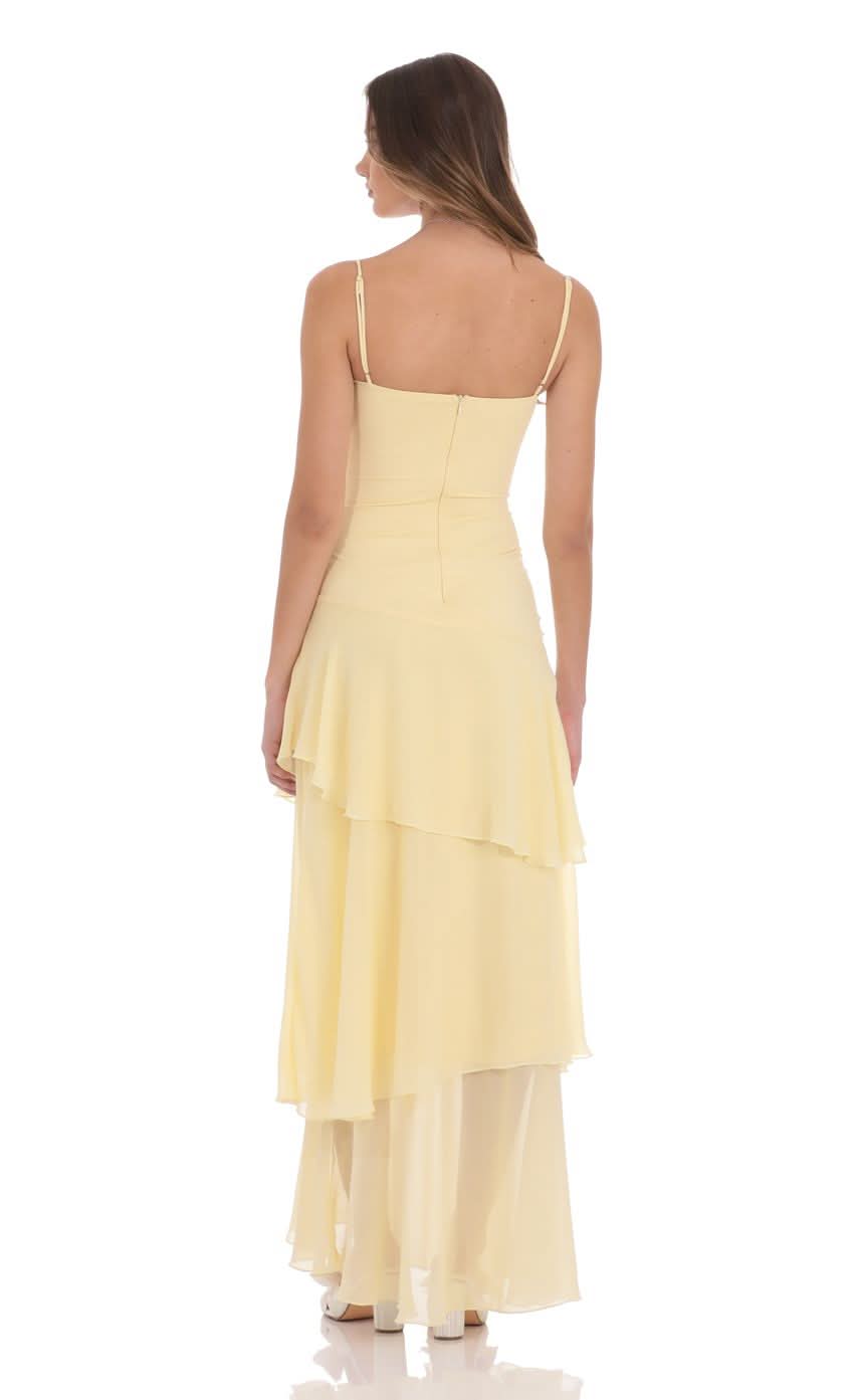 Women wearing the Harrow Irina playful ruffle maxi dress with sweetheart neckline, perfect for wedding guests.