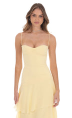 Women wearing the Harrow Irina playful ruffle maxi dress with sweetheart neckline, ideal for wedding guest attire.